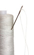 White bobbin with needle isolated on white