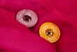 Two buttons on pink background