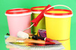 Set for painting: paint pots, brushes, paint-roller, palette of
