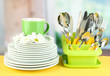 Plates, forks, knives, spoons and other kitchen utensil