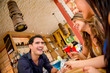 Women paying for drinks at the bar