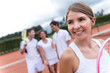 Woman at a tennis court