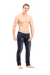 Full length portrait of a shirtless handsome guy looking at came