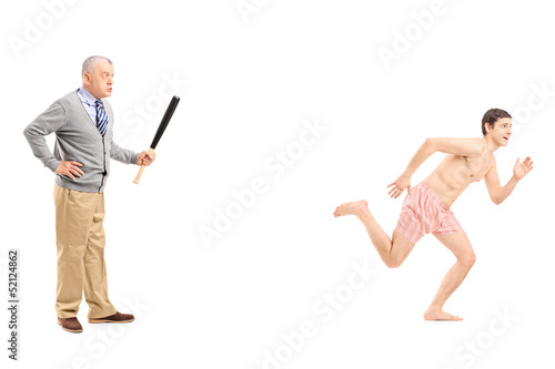 Photo: Angry man chasing a naked man Angry man chasing a naked man