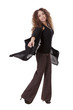Woman spins with long black shirt flowing behind her.