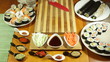 Closeup of preparing chopping board and knife for Sushi roll cut