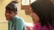 Young women at school, group of friends, students talking