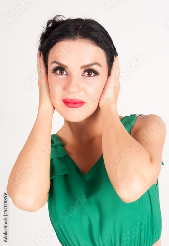 Photo: Pretty woman with closed ears Pretty woman with closed ears