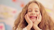 Smiling Girl Lying on Floor
