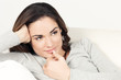 Foto: Cute woman on the sofa Cute woman on the sofa