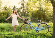 Young woman with bike