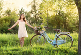 Young woman with bike