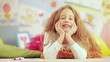 Smiling Girl Lying on Floor