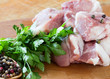 Fresh raw meat on wooden background with pepper in spoon