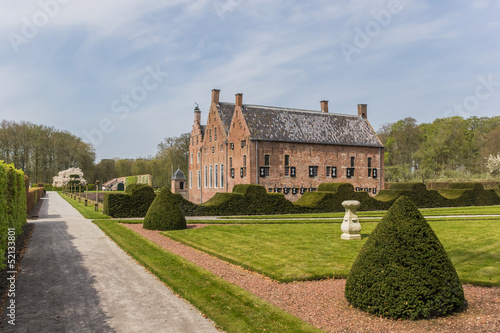 Photo: Garden and the old dutch mansion Menkemaborg Garden and the old dutch mansion Menkemaborg