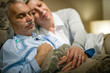 Photo: Retired ill man and caring wife sleeping Retired ill man and caring wife sleeping