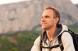 Young man height enjoy after climbing on the mountain