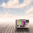 retro portable television on pier