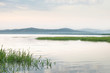 relaxing minimal landscape with lake and hills