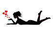silhouette of a woman lying on her stomach