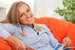 Photo: Young blond woman smiling Young blond woman smiling