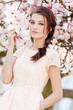 Photo: junge lachende frau und magnolien portrait junge lachende frau und magnolien portrait