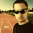 Photo: stylish man with black sun glasses stylish man with black sun glasses