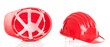 Red builder's caps on a background