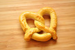 Large Baked Pretzel on a Wood Table