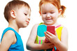 boy and girl playing with mobile