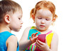 boy and girl playing with mobile