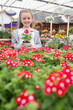 Photo: Child holding a flower pot Child holding a flower pot