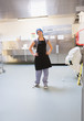 Photo: Cleaning woman standing in kitchen Cleaning woman standing in kitchen