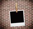 Instant photo hung with peg
