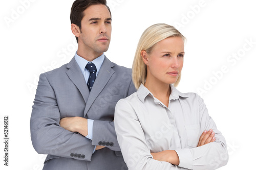 Photo: Serious colleagues looking at the same way Serious colleagues looking at the same way