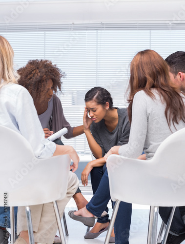 Photo: Therapist encouraging a patient Therapist encouraging a patient