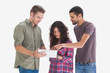 Stylish friends looking at tablet