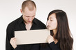 Photo: couple with sign couple with sign