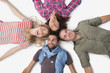 Photo: Overhead of friends lying in a circle Overhead of friends lying in a circle