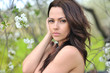 Closeup portrait of young beautiful sexy woman on the nature