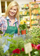 Woman working in garden center
