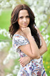 Portrait of the young beautiful smiling woman outdoors