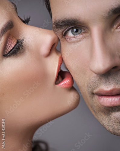 Photo: Happy handsome guy with his sensual girlfriend Happy handsome guy with his sensual girlfriend