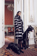 Photo: Fashion model posing in a fur coat Fashion model posing in a fur coat