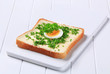 Bread with butter and chopped parsley