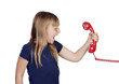 Funny little girl shoutin whit a red phone