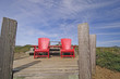 Photo: red chairs on a mountain top lookout red chairs on a mountain top lookout