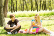 Young couple enjoying a picnic