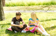 Young friends enjoy a healthy picnic