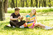 Handsome boyfriend hot girlfriend on picnic